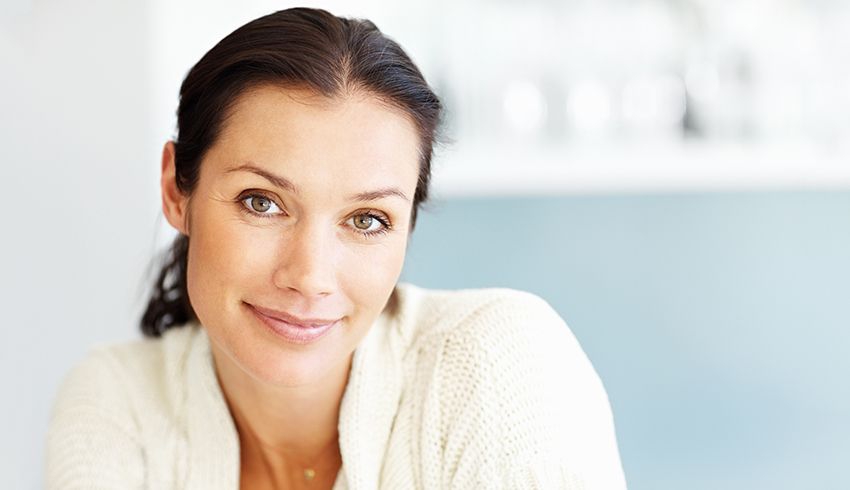 A mature woman smiling